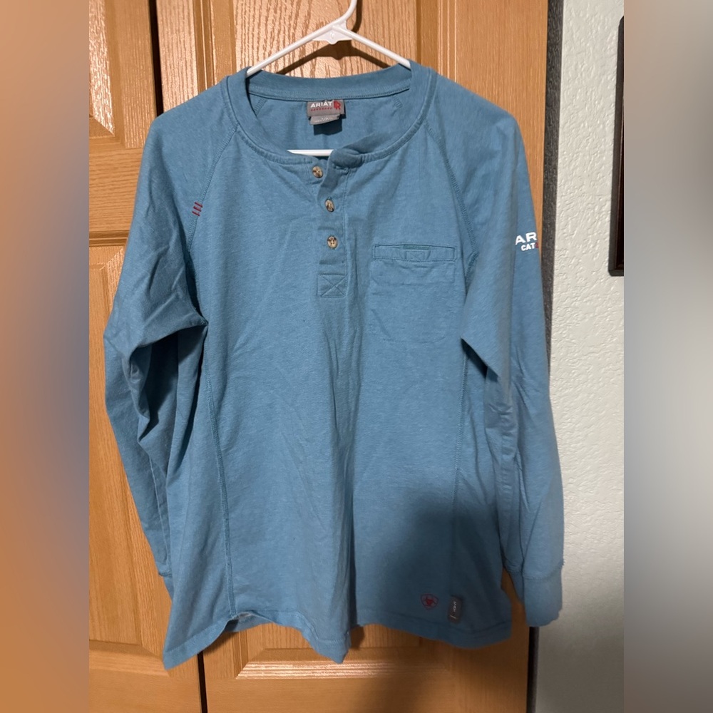 Ariat FR long sleeves T botton  light blue.  large. Short torso